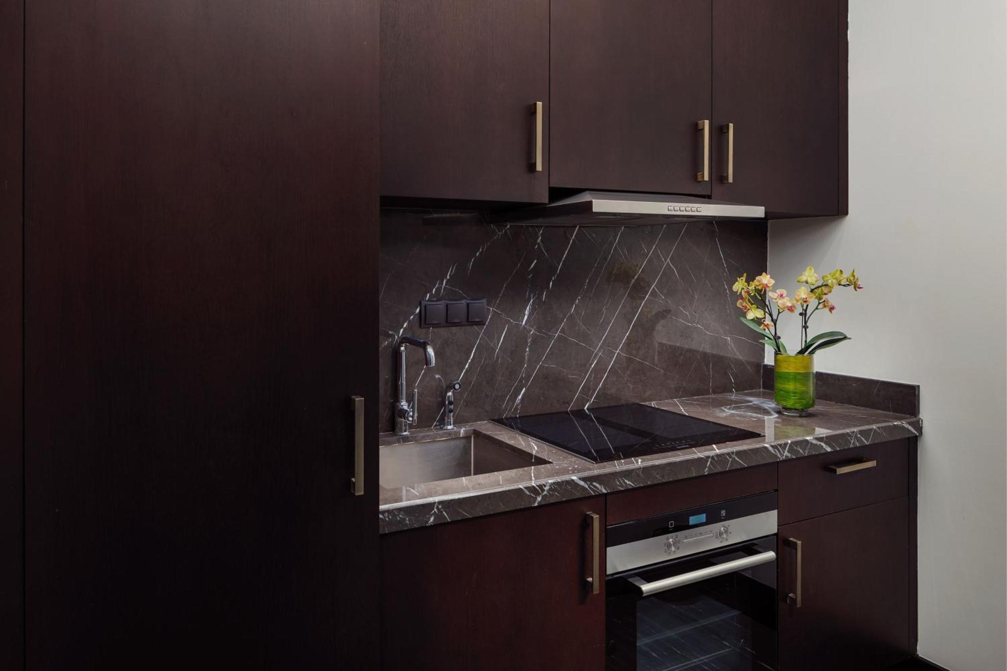 Отель The St. Regis Astana Экстерьер фото A kitchen in a typical apartment